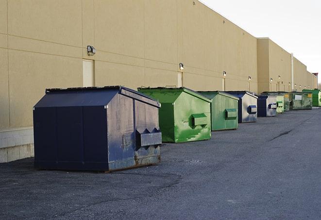 a view of a dumpster truck on a construction site in Azle, TX